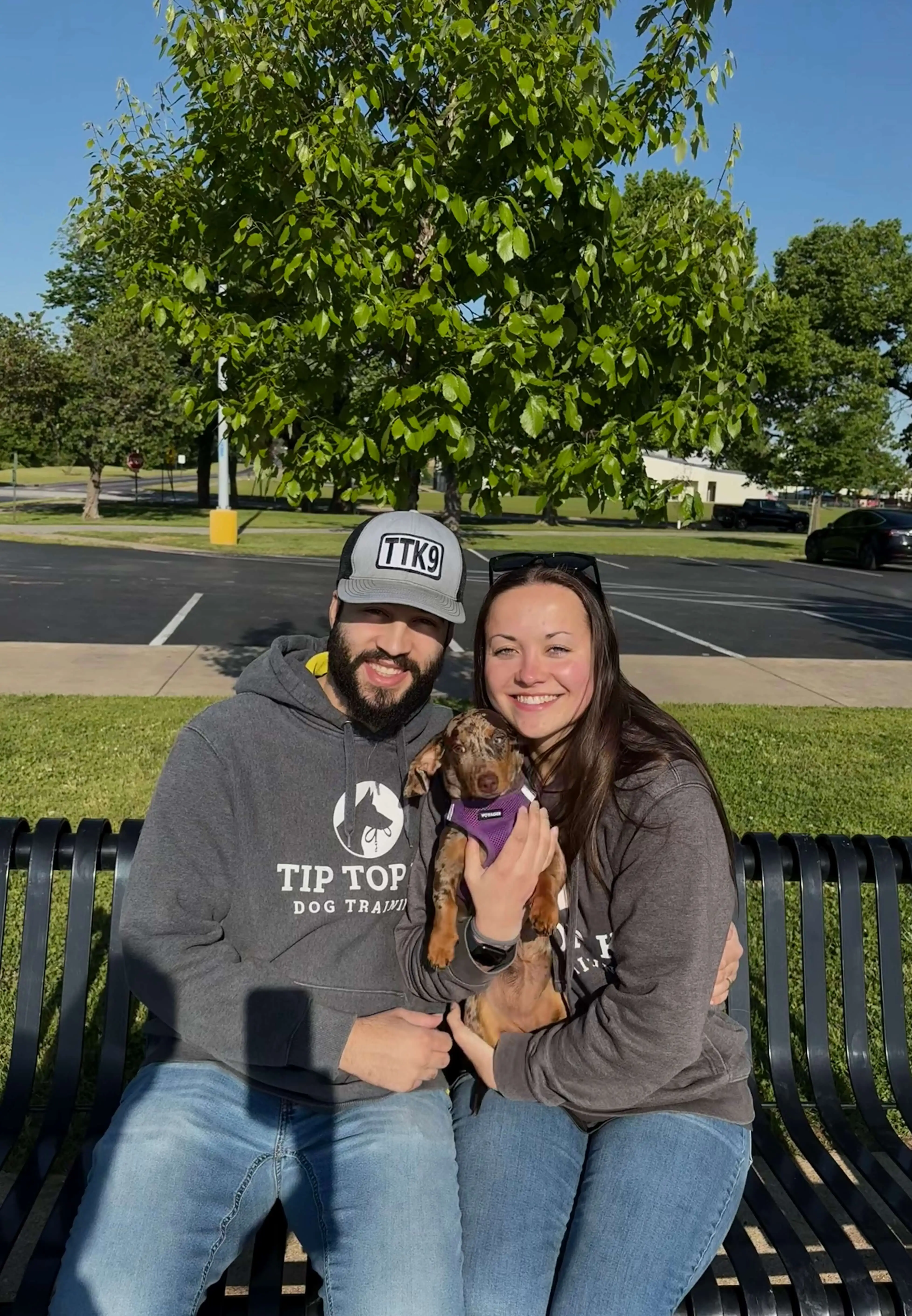 Tip Top K9 NW Arkansas trainers Brock and Alyssa, who serve Gentry-area dog owners in their homes